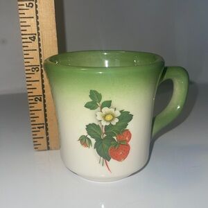 Vintage mug with strawberry